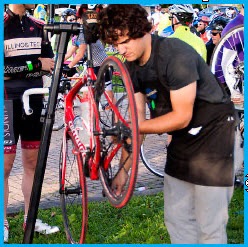 Mechanic providing bike support